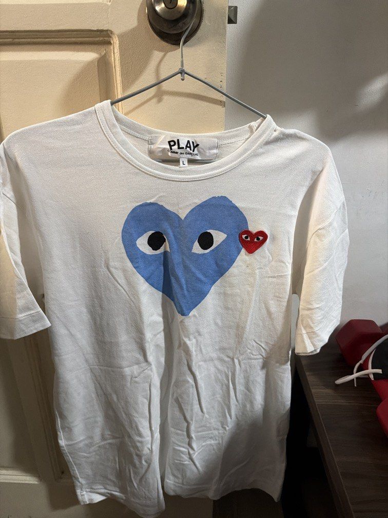 Comme des garcons (Category: Shirts) located in Pasig City. Submitted by shellbyf (Listing ID 1466780821, Image 2). Description: Comme des garcons Guaranteed original Size Large.