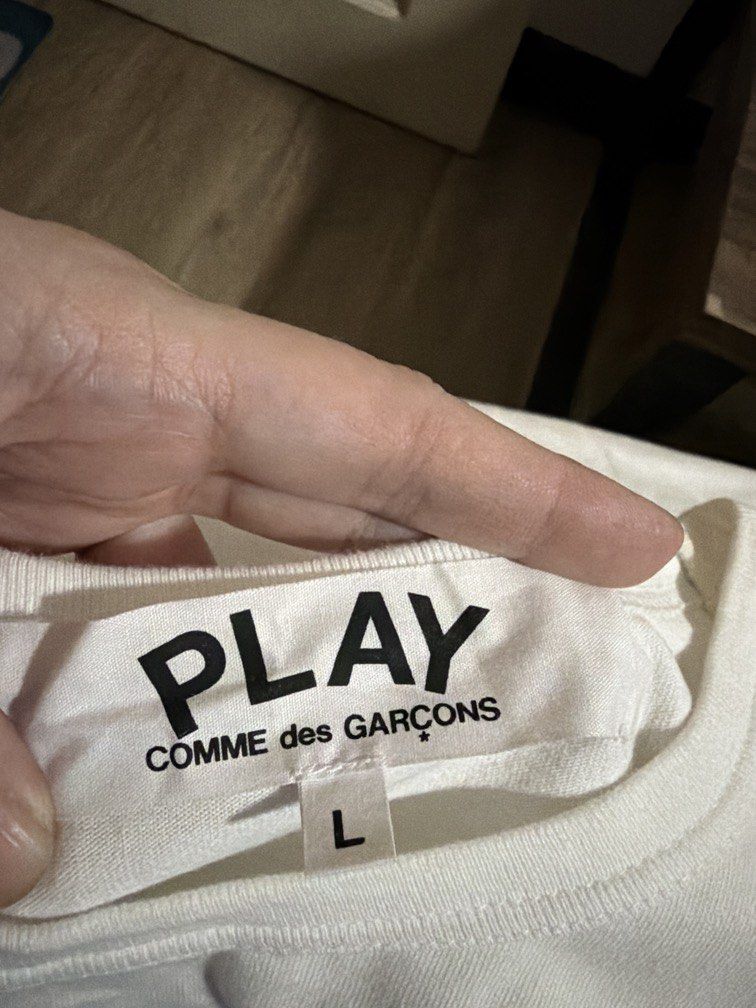 Comme des garcons (Category: Shirts) located in Pasig City. Submitted by shellbyf (Listing ID 1466780821, Image 1). Description: Comme des garcons Guaranteed original Size Large.