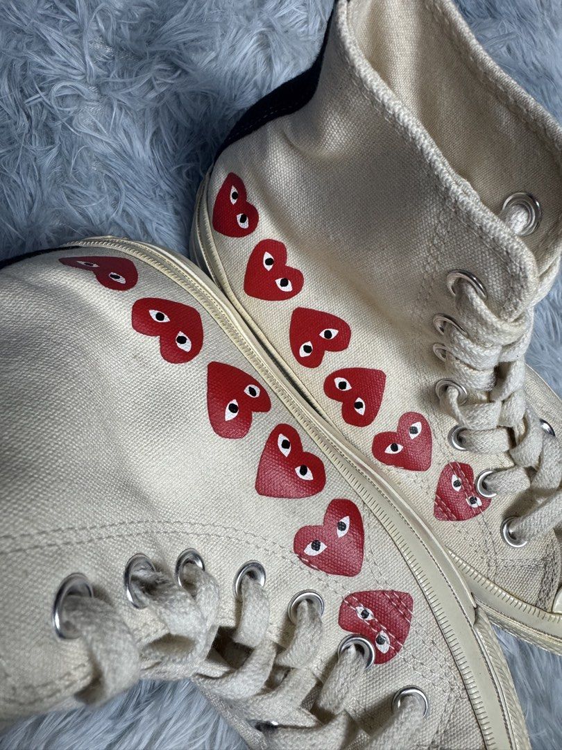 Converse x CDG High (Category: Sneakers) located in Taguig. Submitted by mrwickjohn67 (Listing ID 1466967068, Image 3). Description: Excellent. Orig almost no heel drags with very minimal sole seps Parchment color rate 9.5/10 Orig lace and insole pa din Size: fits 6-6.5W .