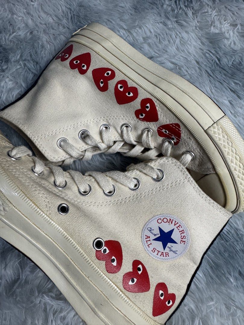 Converse x CDG High (Category: Sneakers) located in Taguig. Submitted by mrwickjohn67 (Listing ID 1466967068, Image 2). Description: Excellent. Orig almost no heel drags with very minimal sole seps Parchment color rate 9.5/10 Orig lace and insole pa din Size: fits 6-6.5W .