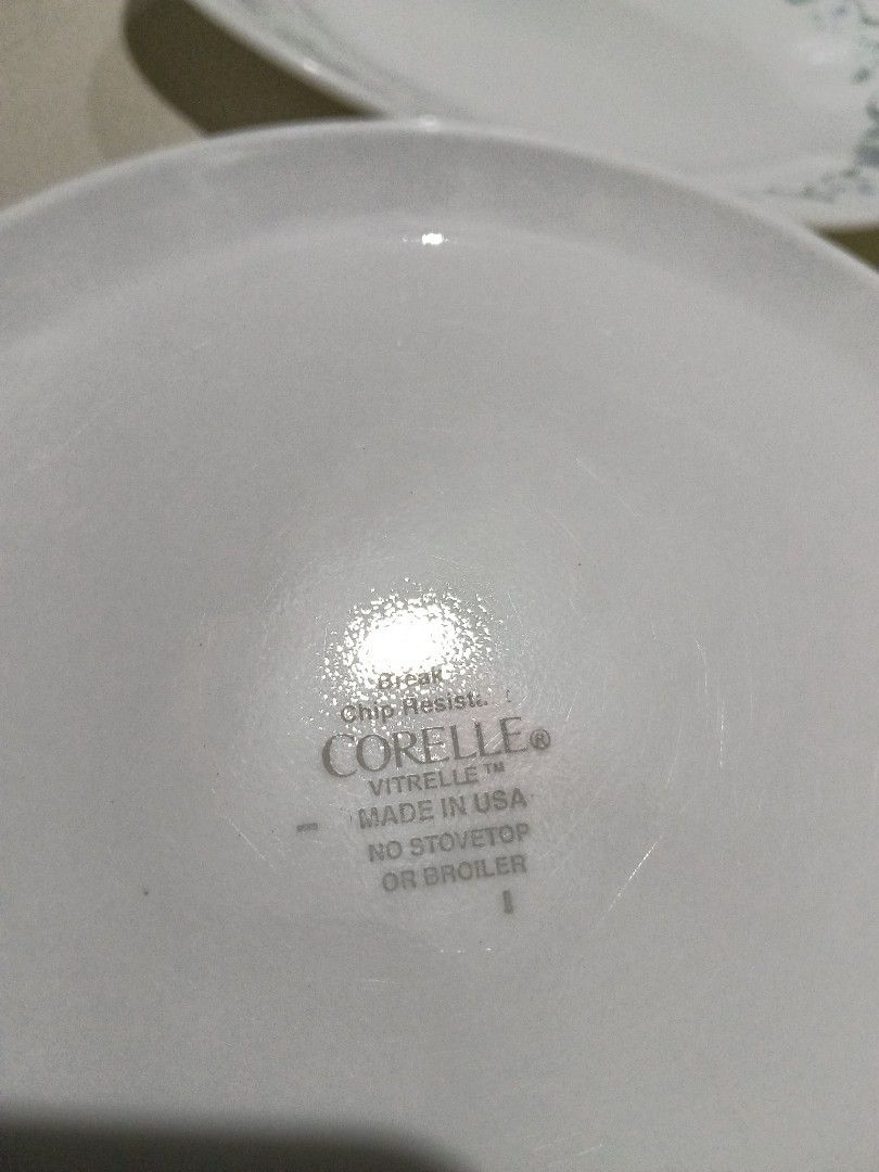 Corelle Vitrelle Heart (Category: Dinnerware & Cutlery) located in Manila. Submitted by zenbear_6b2d8a (Listing ID 1466914312, Image 2). Description: - Genuine Corelle dinnerware made in USA - Set of 5 durable Vitrelle glass plates - Designs: 3 with blue heart vine pattern, 2 with pastel floral patter n - Break and chip resistant for everyday use - Microwave safe (do not use on stovetop or broiler) take all for 350 .