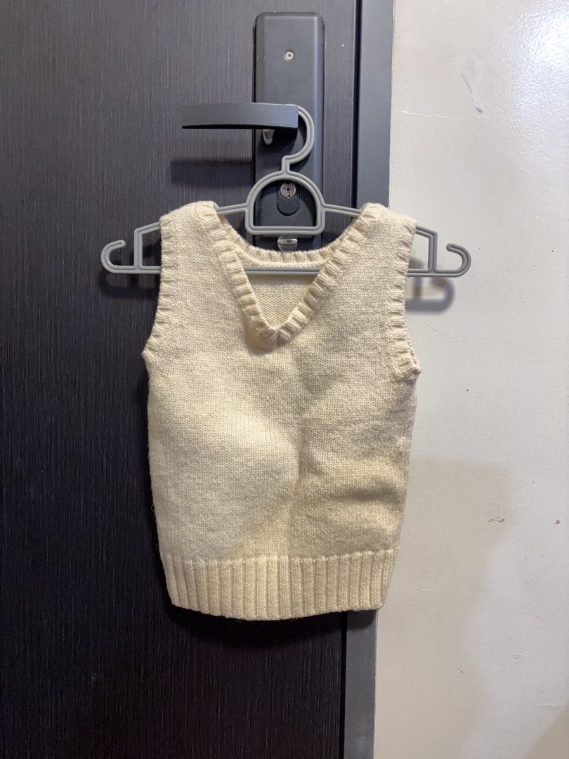 Cream Knit V-Neck Sweater Vest (Category: Sleeveless) located in Tuguegarao City. Submitted by polkaprincess (Listing ID 1466928897, Image 1). Description: - Color: Cream / Off-white - Style: V-neck knit sweater vest - Size: XS (EU 34 / UK 6 / US 2) - Material: Soft and comfortable knit - Condition: Excellent pre-loved condition - Perfect for layering over shirts for a stylish, casual look.