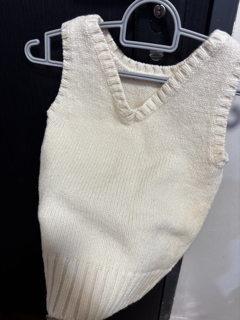 Cream Knit V-Neck Sweater Vest (Category: Sleeveless) located in Tuguegarao City. Submitted by polkaprincess (Listing ID 1466928897, Image 3). Description: - Color: Cream / Off-white - Style: V-neck knit sweater vest - Size: XS (EU 34 / UK 6 / US 2) - Material: Soft and comfortable knit - Condition: Excellent pre-loved condition - Perfect for layering over shirts for a stylish, casual look.