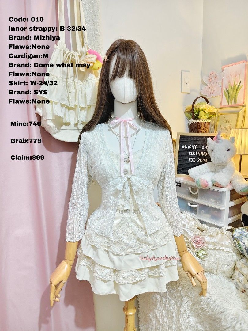 Cream Lace Coordinator Set with Heart Buttons (Category: Sets or Coordinates) located in Manila. Submitted by chynii_28 (Listing ID 1466870386, Image 1). Description: - Color: Soft cream - Set includes: Cropped lace cardigan and matching layered ruffle skirt - Top details: Pearl heart buttons, satin panels, and stylish cutout waist - Style: Angelic, coordinative, and sweet - Condition: Brand new / Excellent (Ready to ship).