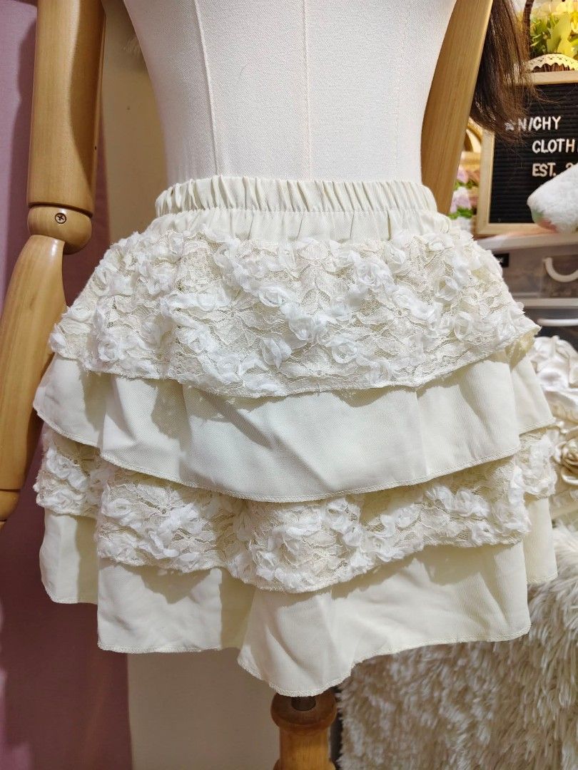 Cream Lace Coordinator Set with Heart Buttons (Category: Sets or Coordinates) located in Manila. Submitted by chynii_28 (Listing ID 1466870386, Image 2). Description: - Color: Soft cream - Set includes: Cropped lace cardigan and matching layered ruffle skirt - Top details: Pearl heart buttons, satin panels, and stylish cutout waist - Style: Angelic, coordinative, and sweet - Condition: Brand new / Excellent (Ready to ship).