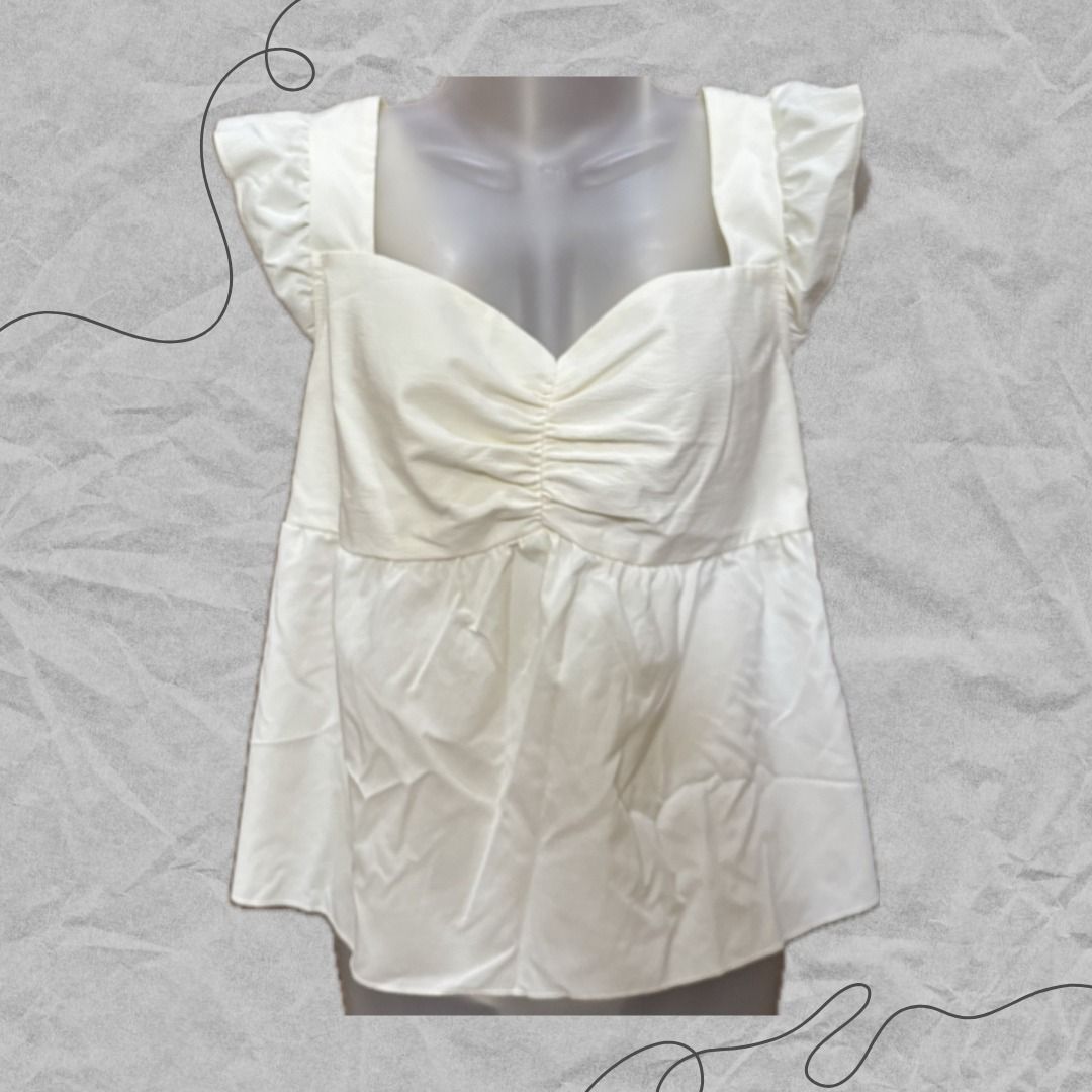 Cream Peplum Top (Category: Blouses) located in Manila. Submitted by lovedbydeviii (Listing ID 1466846572, Image 1). Description: Cream Peplum Top 🧵Php 180 👗Size: L 👗BRAND NEW (Never used) * note that color may slightly vary due to lighting .