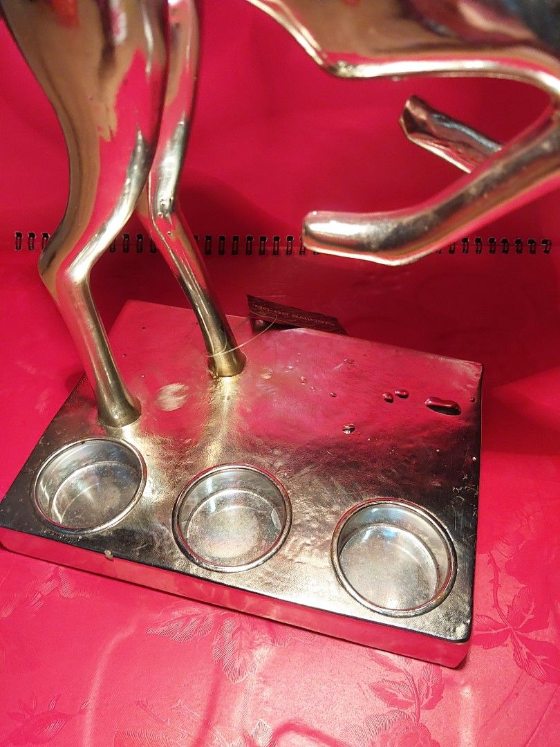 Vintage Deer Sculpture with 3 tealight cups (Category: Figurines & Statues) located in Manila. Submitted by bryantoyshop (Listing ID 1466827665, Image 3). Description: height : 15 inches weight : 1 kg - Unique vintage silver deer figurine - Functions as a candle holder for 3 tealights - Perfect statement piece for tables or shelves.