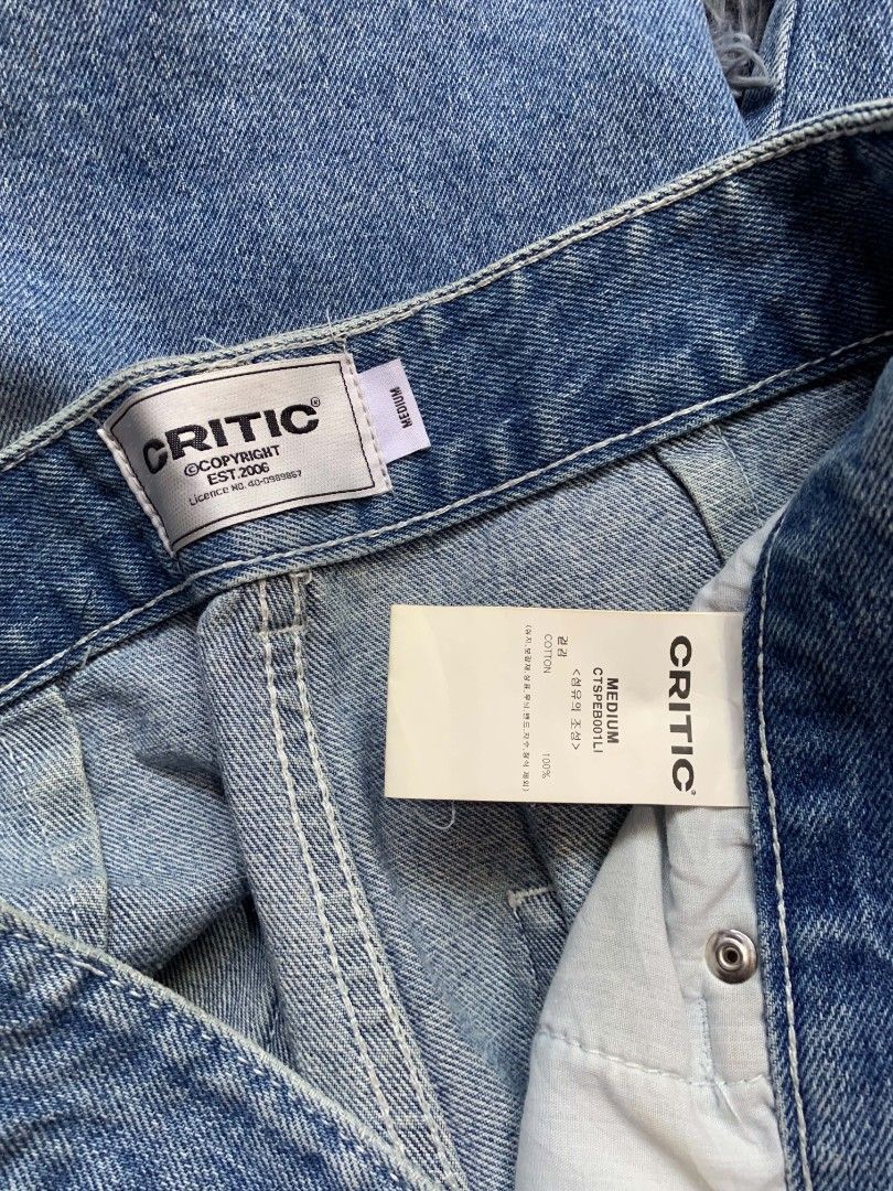 Critic Denim Cargo Shorts (Category: Shorts) located in Pagadian. Submitted by duskthrift (Listing ID 1466778351, Image 3). Description: - Brand: Critic (Korean streetwear brand) - Item: Denim cargo shorts - Size: Medium - Color/Wash: Medium wash with distressing - Material: 100% heavyweight cotton - Features: Multiple utility pockets on front, sides, and back - Condition: Brand new with waist and interior tags attached.