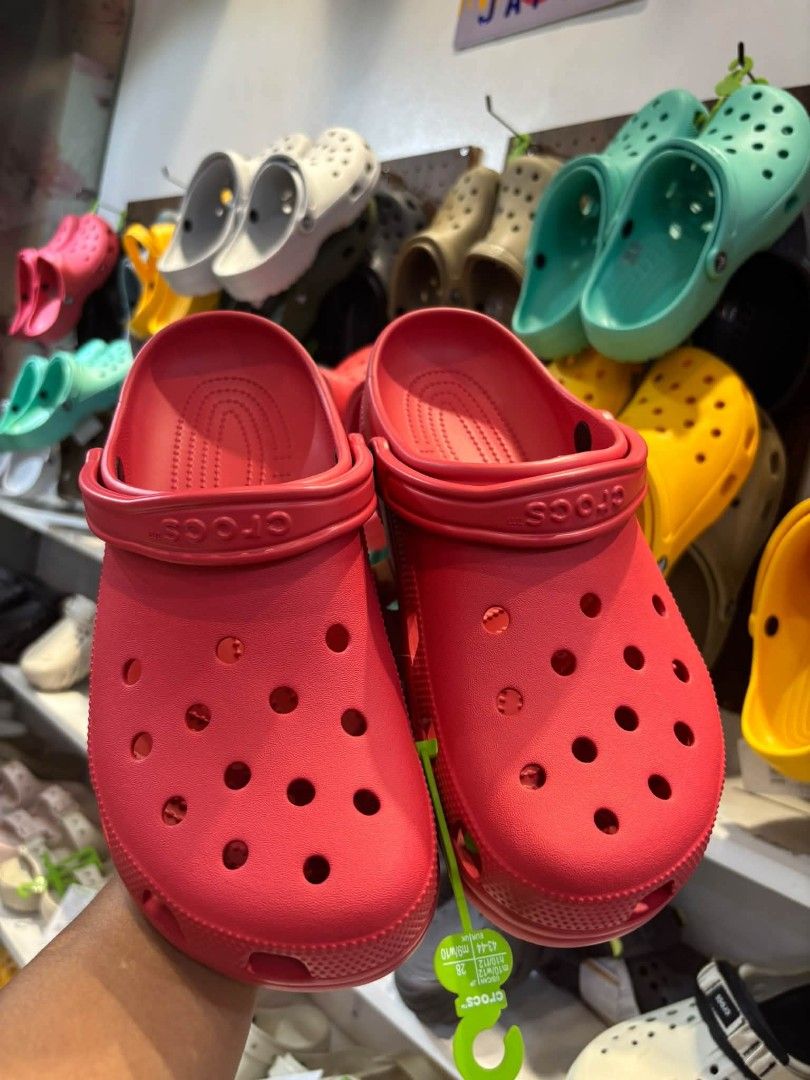 Crocs Classic Clog Sandals Various Colors (Category: Slippers and slides) located in Cebu City. Submitted by madeskartegirl (Listing ID 1466786229, Image 2). Description: - Available Colors: Red, Mint Green, and Yellow - Iconic ventilation ports add breathability and shed water - Pivoting heel straps for a more secure fit - Incredibly lightweight and fun to wear - Water-friendly and buoyant (great for everyday casual use).