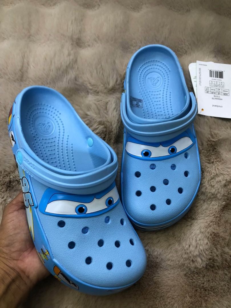 Crocs Lightning McQueen Cars Clogs Blue (Category: Slippers & Slides) located in Manila. Submitted by khielnatha93179 (Listing ID 1466795775, Image 1). Description: - Authentic quality / top grade - Size : 36 to 45 - Brand: Disney Cars Lightning McQueen Crocs - Color: Light blue with fun character eyes printed on front - Condition: Brand new with original store tag attached - Comfort: Breathable ventilation holes and relaxed fit style - Fit: Secu