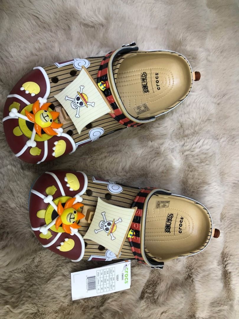 Crocs x One Piece Classic Clog Thousand Sunny (Category: Slippers and slides) located in Manila. Submitted by khielnatha93179 (Listing ID 1466792105, Image 3). Description: - Actual photos posted already - Top grade authentic quality - Size : 36 to 45 - Model: Crocs x One Piece Classic Clog - Condition: Brand new with tags attached - Design: Inspired by the Thousand Sunny ship with sun figurehead on the toe - Accents: Includes sail Jibbitz and st