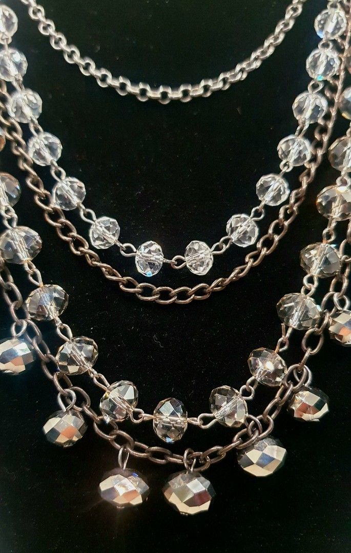 Crystal Beaded Multi-Strand Statement Necklace with Gunmetal Chains (Category: Necklaces) located in San Juan City. Submitted by loulous_boutique_manila (Listing ID 1466920842, Image 3). Description: 🌸 Multi-strand layered design for a full, draped look 🌸 Gunmetal-toned chains paired with sparkling faceted clear crystals 🌸 Dangling glass bead charms on lower tiers 🌸 Length of Necklace Layers: 1st Layer: 16 inches 2nd Layers: 18 inches 3rd Lay