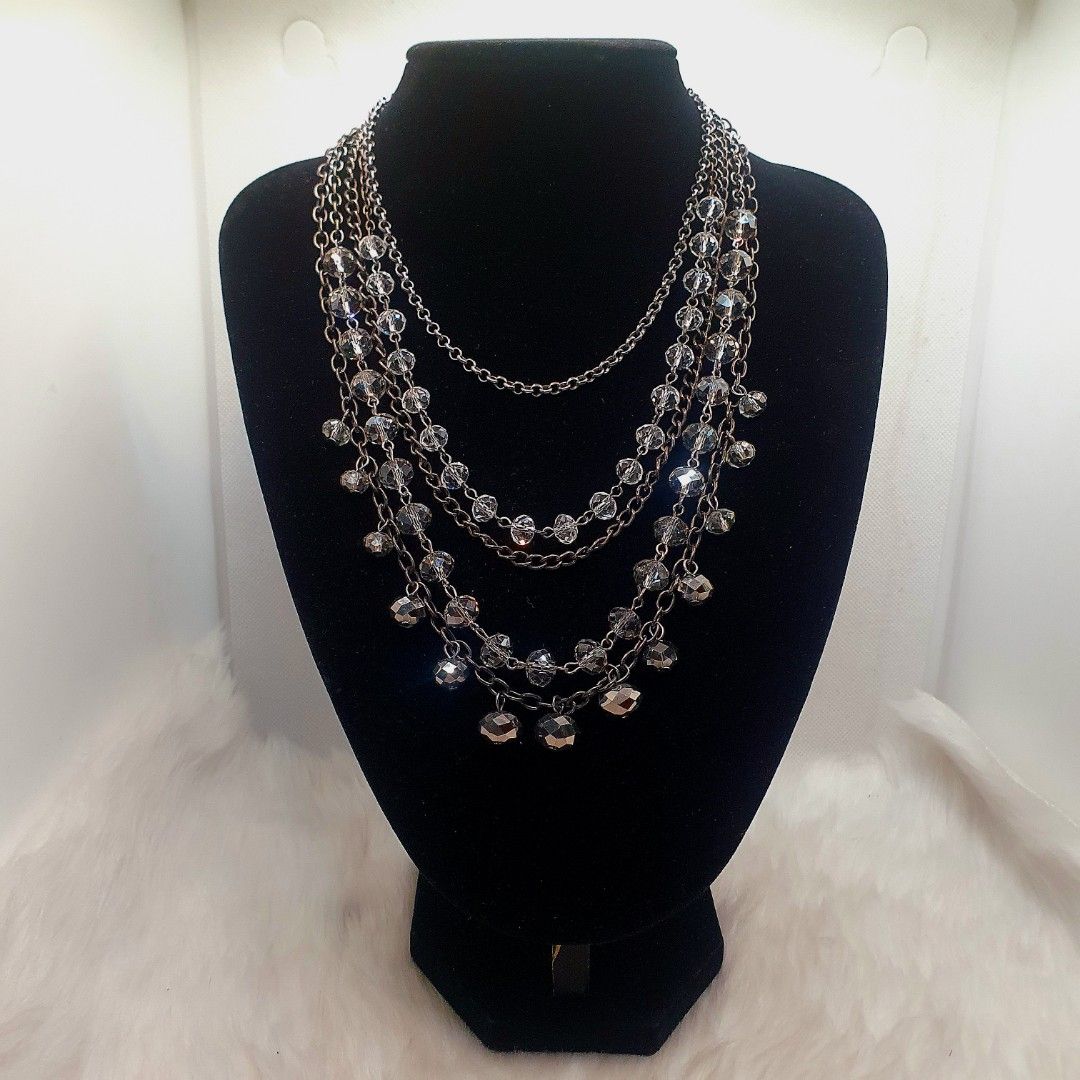 Crystal Beaded Multi-Strand Statement Necklace with Gunmetal Chains (Category: Necklaces) located in San Juan City. Submitted by loulous_boutique_manila (Listing ID 1466920842, Image 2). Description: 🌸 Multi-strand layered design for a full, draped look 🌸 Gunmetal-toned chains paired with sparkling faceted clear crystals 🌸 Dangling glass bead charms on lower tiers 🌸 Length of Necklace Layers: 1st Layer: 16 inches 2nd Layers: 18 inches 3rd Lay