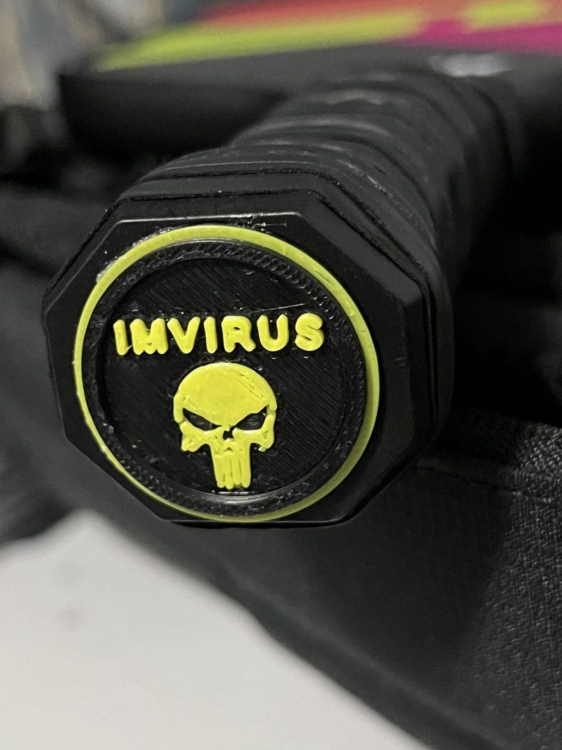 Custom 3D Printed Pickleball Paddle Butt Cap/End Cap (Category: Racket and Ball Sports) located in Marikina City. Submitted by johnurbina (Listing ID 1466903417, Image 2). Description: Custom 3D printed butt caps for pickleball paddles. Includes personalized inserts featuring names like IMVIRUS, JR, LU R., and JHUNE alongside a skull logo design. Black base with vibrant yellow raised lettering. Great way to customize your gear and tell your paddl