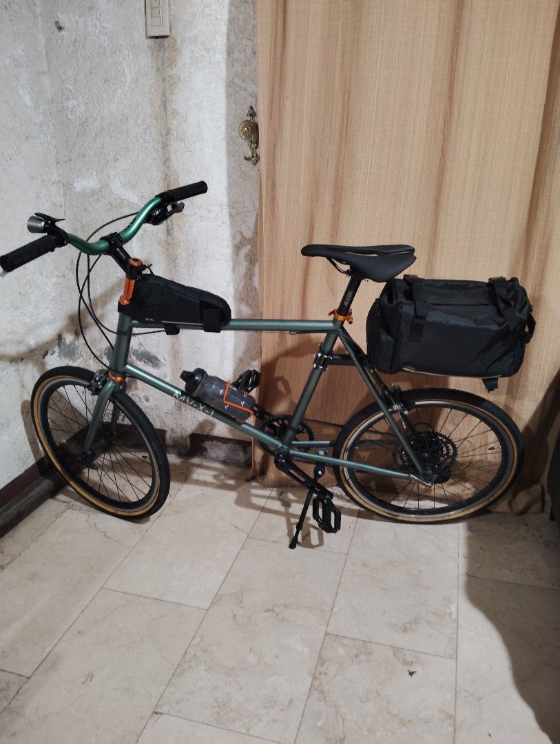 Custom Built Mini-Velo 451 Bike (Category: Bicycles) located in Lipa City. Submitted by andoyzski (Listing ID 1466965008, Image 1). Description: Custom built Reunion Neel 451 Mini-Velo. Metallic Green color. Built with reliability and touring/ urban versatility. The bike is less than 6 months old, seldom used, and kept in great condition. (Some hairline scratches) Specifications: • Frame: Asahi Reunion Neel 451 (Japan Surplus) •Seat Tube 48cm, To