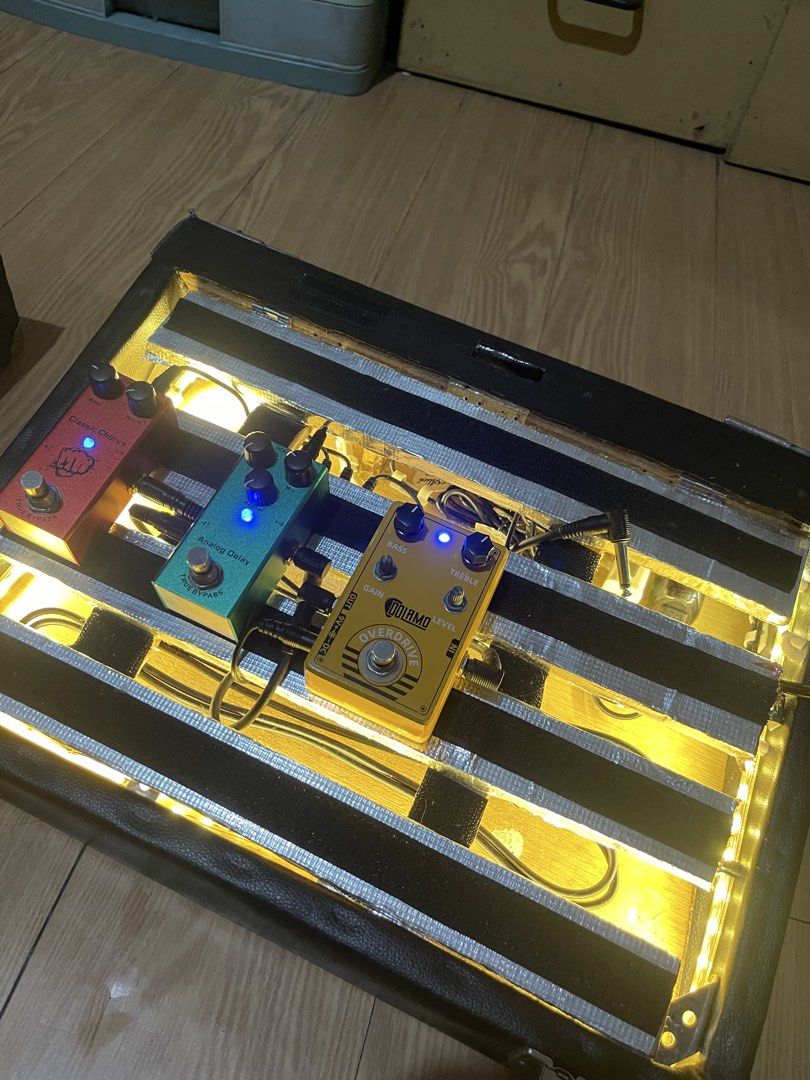 Custom Guitar Pedal Board with Case and 3 Pedals (Category: Musical Instruments) located in Manila. Submitted by giancarlob08614 (Listing ID 1466929645, Image 1). Description: may discount! 1 - Overdrive Pedal (Dolamo) 1 - Analog Delay Pedal 1 - Classic Chorus 1 - Power Supply - connecting 6.5mm jack mini wires - extra wires for power supply - led lights - brushless fan what you see is what you get Can do meet ups at - Megamall - Sm Makati - Glor
