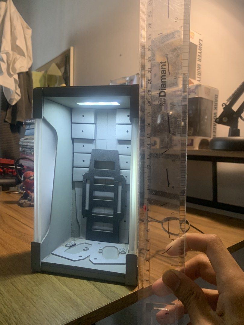 Custom Hall of Armor (Category: Figurines & Statues) located in Manila. Submitted by sellingmy.stuff (Listing ID 1466877168, Image 3). Description: - Custom Hall of Armor display stand with built-in LED lighting (Plug in, no need for batteries) -K.O Tony Stark already sold - Approximate height: 18cm (refer to measurement photos) - Excellent centerpiece for Marvel and Iron Man action figure collectors Custom Hall of Armor Diorama (1 of 1) Not maki
