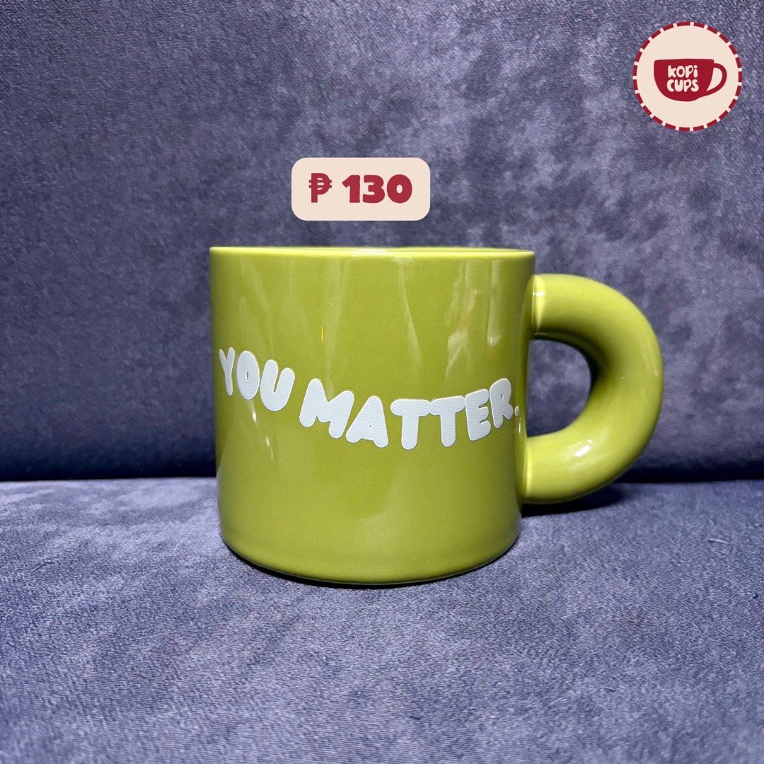 Cute Green Ceramic Mug (Category: Coffee & Tea Tableware) located in General Trias. Submitted by dddddaph (Listing ID 1466882138, Image 1). Description: Thick, rounded handle and straight-sided body with a smooth glazed finish LOCATION: General Trias City, Cavite MOD: Lalamove/ J&T Cute and aesthetic mugs perfect for your coffee, tea, or as a gift for someone special!🧸✨ 📌 Please Read Before Ordering: * These are factory pull-out mugs, so minor 