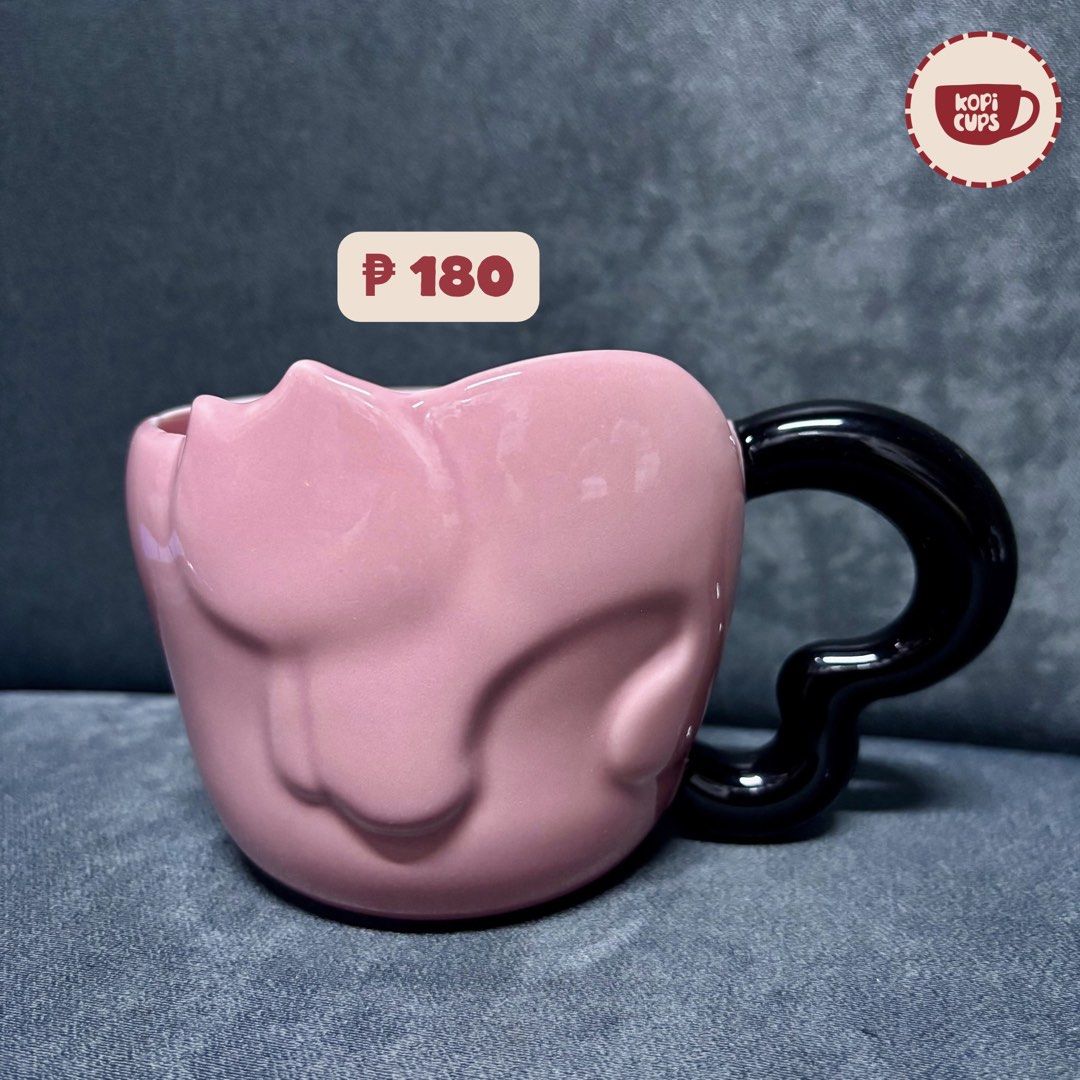 Cute Pink Ceramic Mug with Abstract Face and Black Handle (Category: Coffee & Tea Tableware) located in General Trias. Submitted by dddddaph (Listing ID 1466885801, Image 1). Description: Eye-catching pink ceramic mug with an abstract sculptural face design LOCATION: General Trias City, Cavite MOD: Lalamove/ J&T 📌 Please Read Before Ordering: * These are factory pull-out mugs, so minor imperfections may be present. * Rest assured that any notice