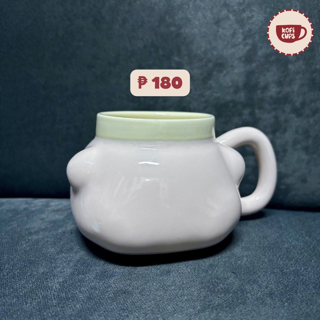 Cute Pink Ceramic Mug with Cream Rim (Category: Coffee & Tea Tableware) located in General Trias. Submitted by dddddaph (Listing ID 1466885799, Image 1). Description: Quirky ceramic mug with a cute light pink body and cream rim LOCATION: General Trias City, Cavite MOD: Lalamove/ J&T 📌 Please Read Before Ordering: * These are factory pull-out mugs, so minor imperfections may be present. * Rest assured that any noticeable flaws, such as cracks or 
