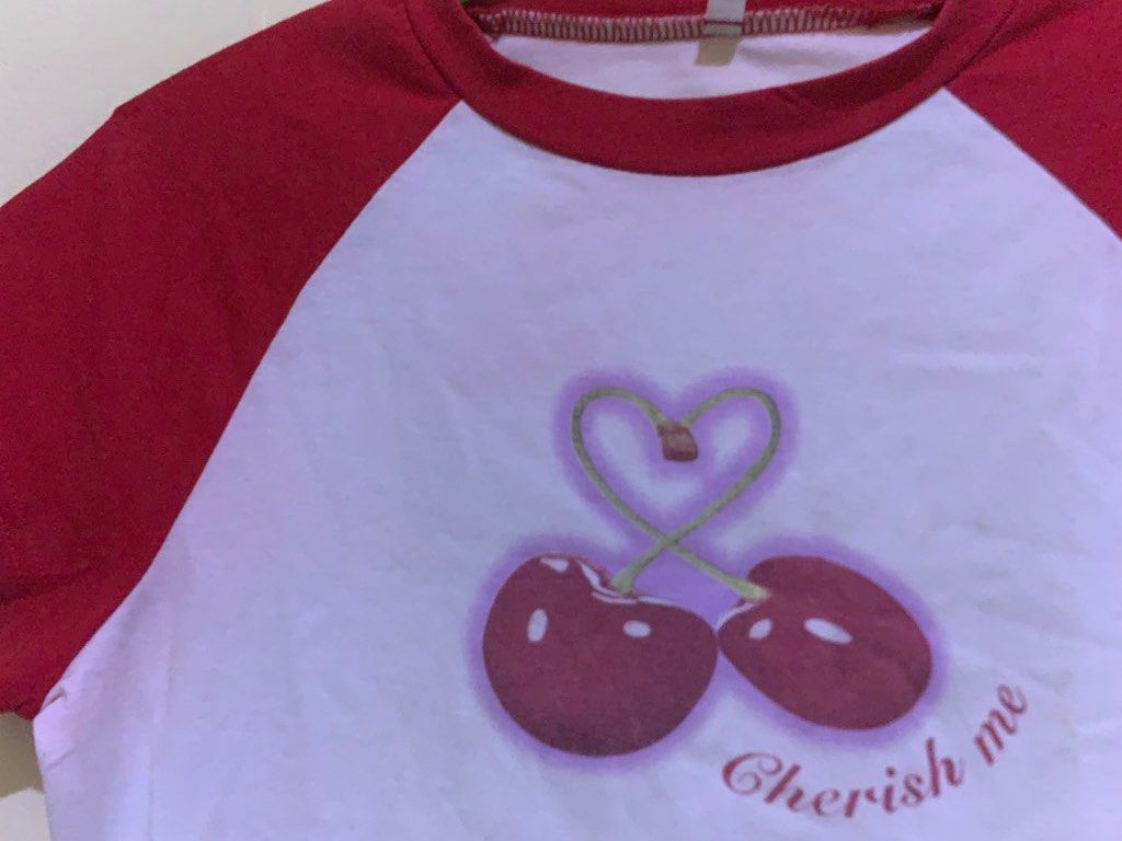 Y2k red cherry crop top size M (Category: Blouses) located in Taguig. Submitted by liandeclutters (Listing ID 1466875735, Image 2). Description: flaw: super cute top but it has a pink stain (not that visible) cos nahaluan siya ng another colored top during laundry 📍Taguig City.