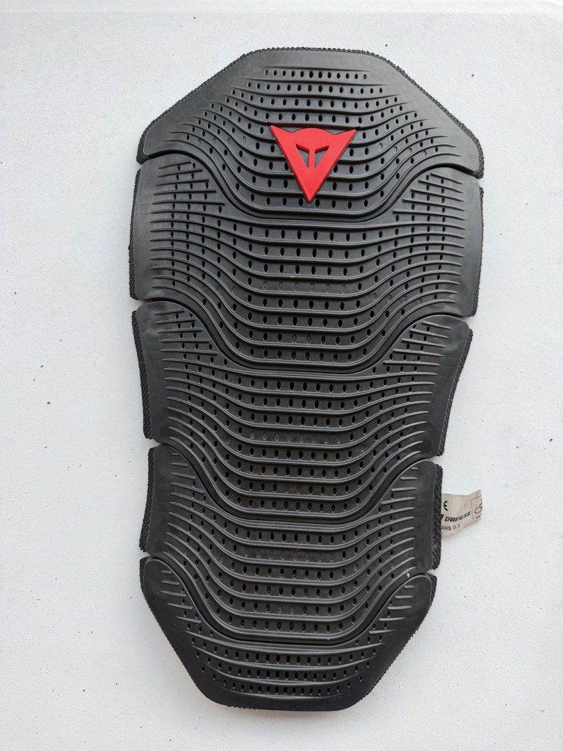 Dainese G.2 Wave Back Protector Armor (Category: Braces, Support & Protection) located in Taguig. Submitted by JBT1968 (Listing ID 1466928934, Image 1). Description: - Authentic Dainese Wave G.2 back protector insert - Standard G2 size, fits most compatible motorcycle jackets - Black outer shell featuring the iconic red Dainese logo - Perforated design ensures great airflow across the spine - Inner foam has yellowed due to age, but structural int