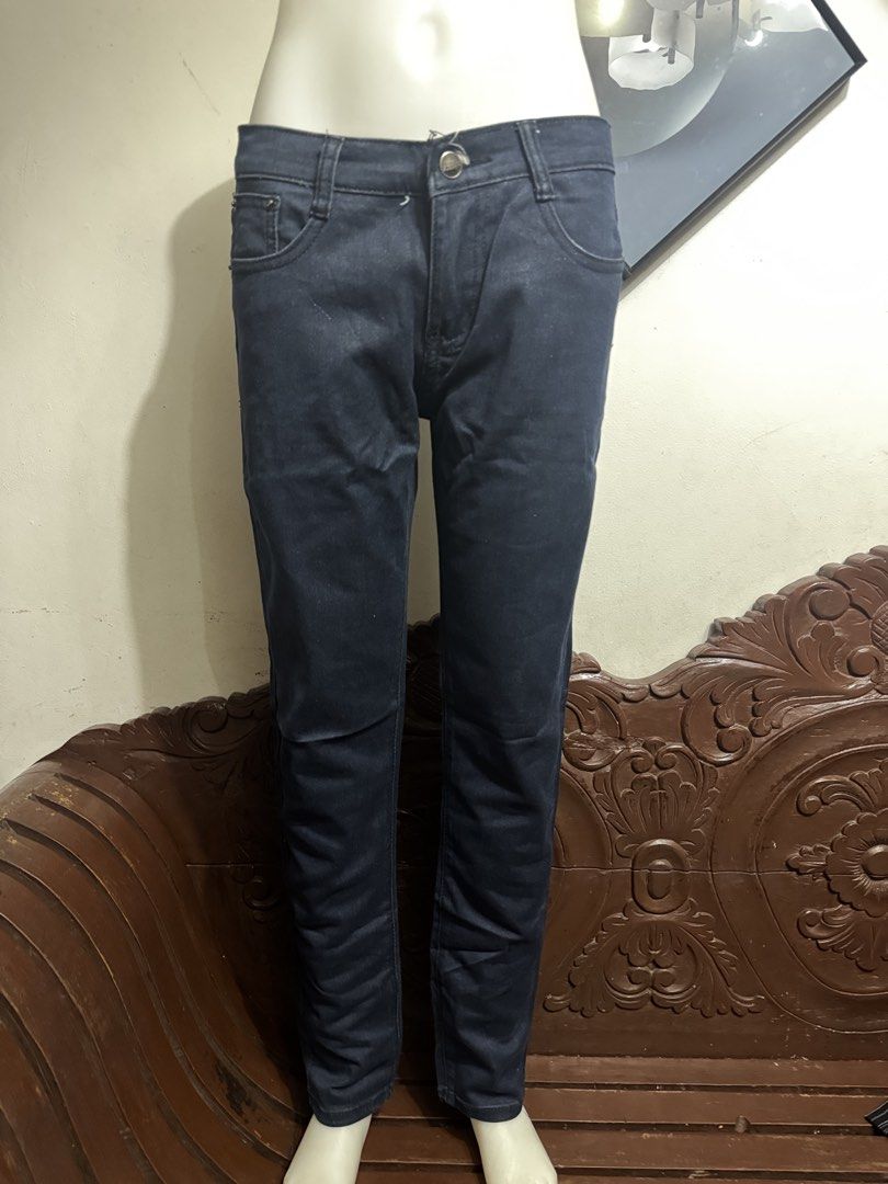 Dark Blue Denim Jeans Slim Fit (Category: Jeans) located in Marikina City. Submitted by lorradel (Listing ID 1466794634, Image 1). Description: - waist on tag 31in but fits up to 33 in - Color: Dark blue - Fit: Slim fit with clean straight legs - Rise: Mid-rise waist with button and zip fly closure - Design: Classic 4-pocket style with stitched back details - Material: comfortable, flattering hug - Condition: Great for daily casual wear -mannequi
