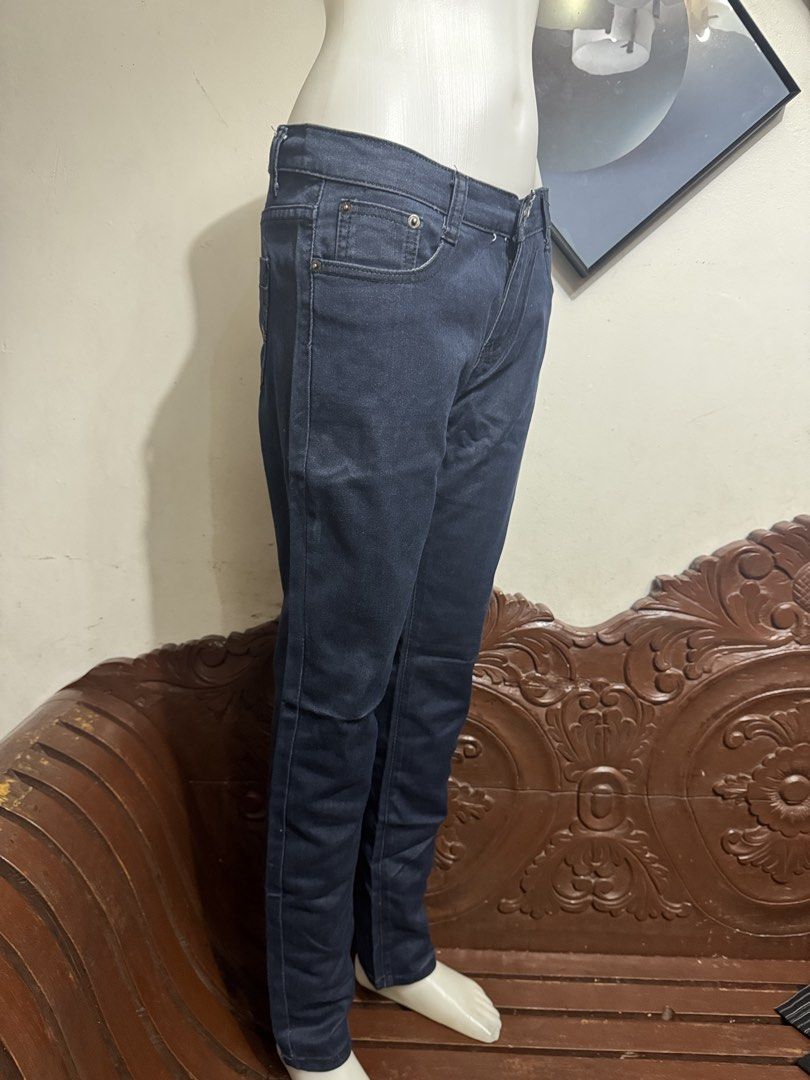 Dark Blue Denim Jeans Slim Fit (Category: Jeans) located in Marikina City. Submitted by lorradel (Listing ID 1466794634, Image 2). Description: - waist on tag 31in but fits up to 33 in - Color: Dark blue - Fit: Slim fit with clean straight legs - Rise: Mid-rise waist with button and zip fly closure - Design: Classic 4-pocket style with stitched back details - Material: comfortable, flattering hug - Condition: Great for daily casual wear -mannequi