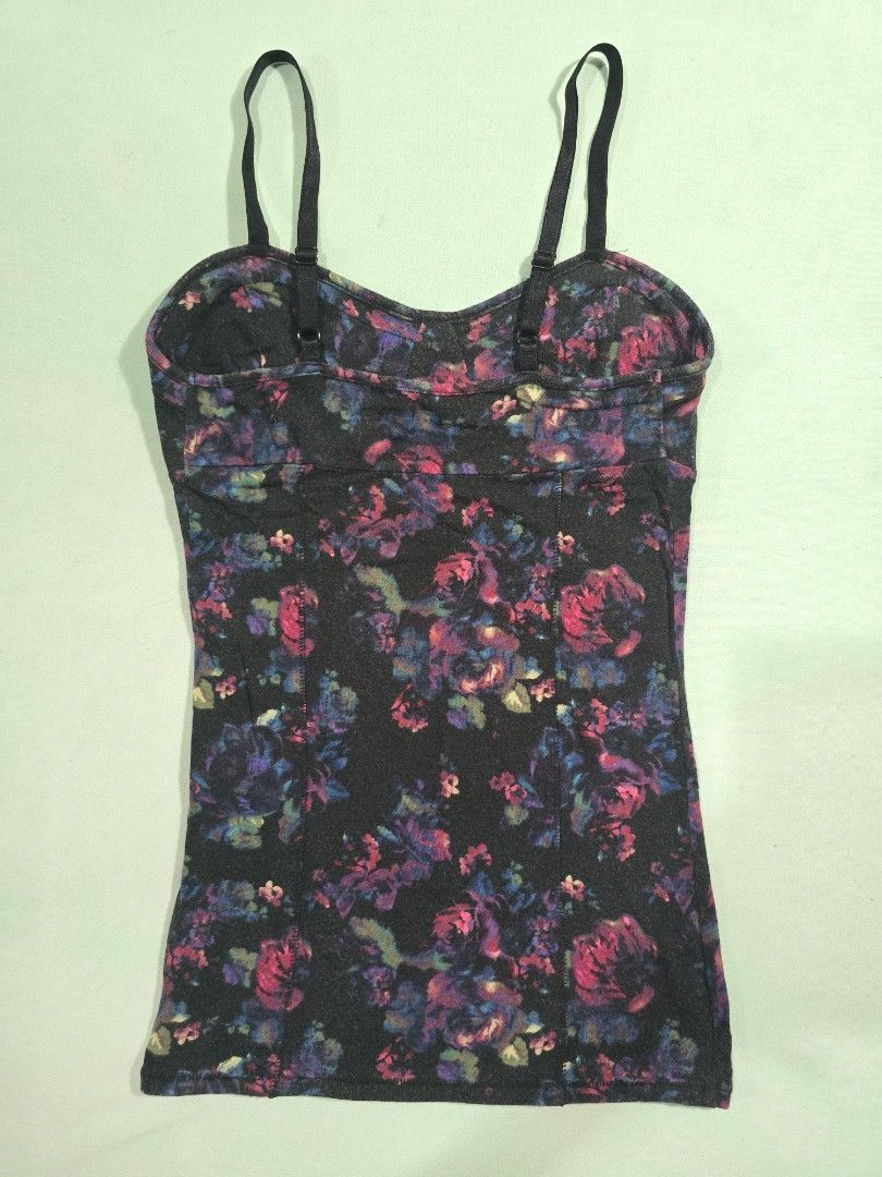 Decree Floral Camisole XS (Category: Sleeveless) located in Quezon City. Submitted by ladypetiteph (Listing ID 1466814570, Image 2). Description: - Brand: Decree - Size: Extra Small (XS) - Design: Black fabric with colorful pink and blue floral rose print - Fit: Fitted style with structured bust cups - Features: Adjustable black spaghetti straps - Material: Soft stretchable cotton modal blend RFS: Decluttering MOP: BDO, Unionbank, GCash First to 