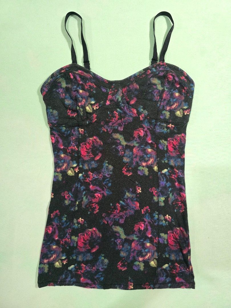 Decree Floral Camisole XS (Category: Sleeveless) located in Quezon City. Submitted by ladypetiteph (Listing ID 1466814570, Image 1). Description: - Brand: Decree - Size: Extra Small (XS) - Design: Black fabric with colorful pink and blue floral rose print - Fit: Fitted style with structured bust cups - Features: Adjustable black spaghetti straps - Material: Soft stretchable cotton modal blend RFS: Decluttering MOP: BDO, Unionbank, GCash First to 