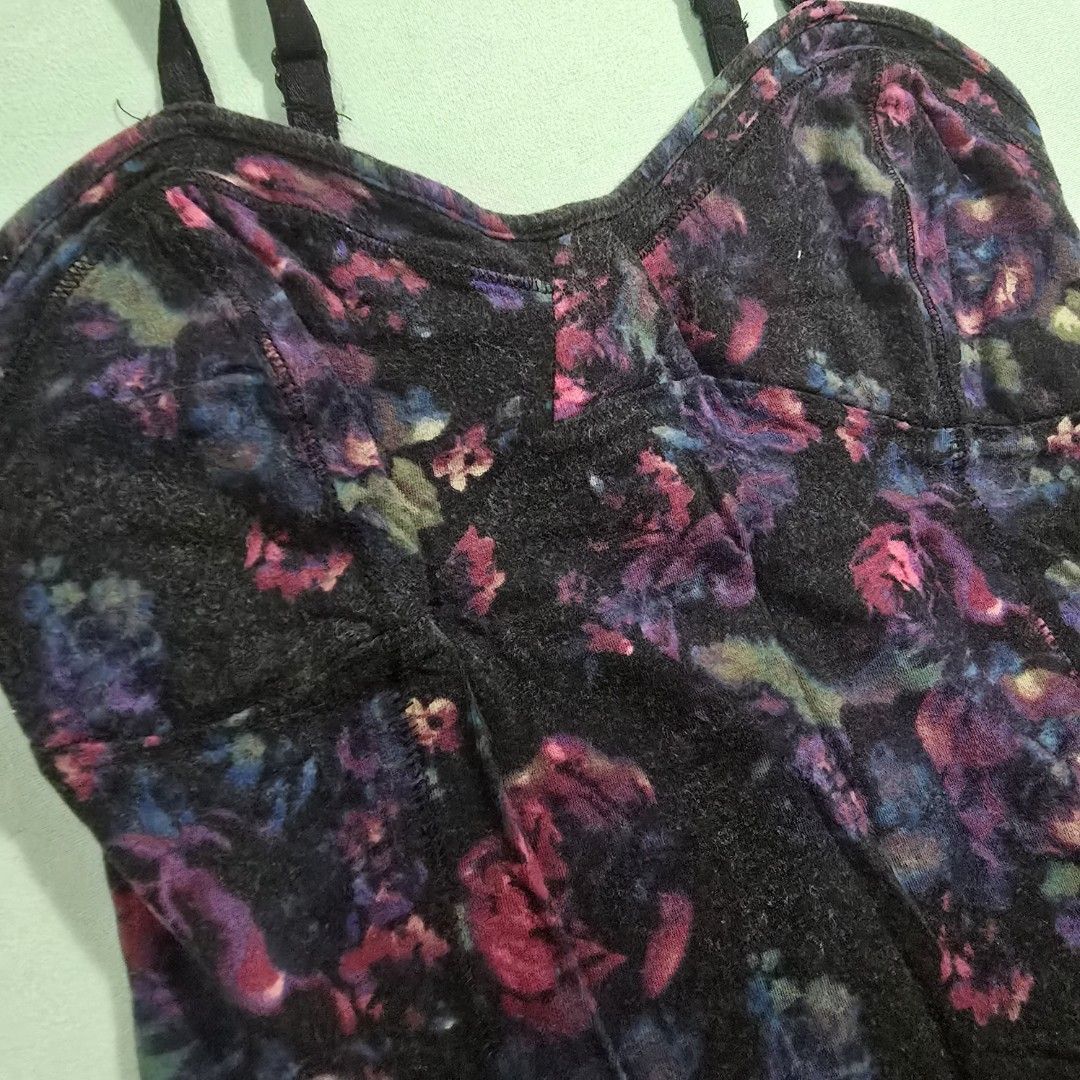 Decree Floral Camisole XS (Category: Sleeveless) located in Quezon City. Submitted by ladypetiteph (Listing ID 1466814570, Image 3). Description: - Brand: Decree - Size: Extra Small (XS) - Design: Black fabric with colorful pink and blue floral rose print - Fit: Fitted style with structured bust cups - Features: Adjustable black spaghetti straps - Material: Soft stretchable cotton modal blend RFS: Decluttering MOP: BDO, Unionbank, GCash First to 