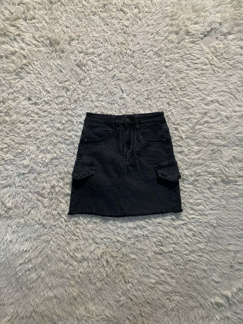 Denim Skirt bundle lot mini skirts (Category: Skirts) located in Cebu City. Submitted by pettydoll_24 (Listing ID 1466928369, Image 2). Description: - Bundle of 3 cute denim mini skirts in different washes and styles - Light wash skirt: Features unique decorative stitching and chic gold buttons - Dark charcoal grey skirt: Trendy side cargo pockets for an edgy look - Medium blue skirt: Classic front patch pockets with a double-button waist - Great