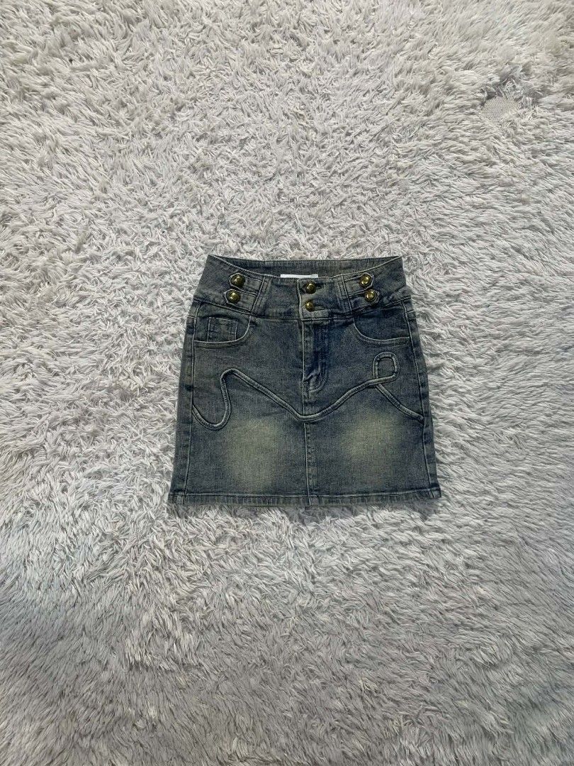 Denim Skirt bundle lot mini skirts (Category: Skirts) located in Cebu City. Submitted by pettydoll_24 (Listing ID 1466928369, Image 1). Description: - Bundle of 3 cute denim mini skirts in different washes and styles - Light wash skirt: Features unique decorative stitching and chic gold buttons - Dark charcoal grey skirt: Trendy side cargo pockets for an edgy look - Medium blue skirt: Classic front patch pockets with a double-button waist - Great