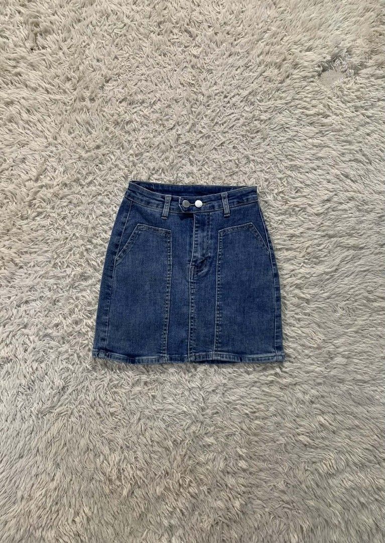 Denim Skirt bundle lot mini skirts (Category: Skirts) located in Cebu City. Submitted by pettydoll_24 (Listing ID 1466928369, Image 3). Description: - Bundle of 3 cute denim mini skirts in different washes and styles - Light wash skirt: Features unique decorative stitching and chic gold buttons - Dark charcoal grey skirt: Trendy side cargo pockets for an edgy look - Medium blue skirt: Classic front patch pockets with a double-button waist - Great