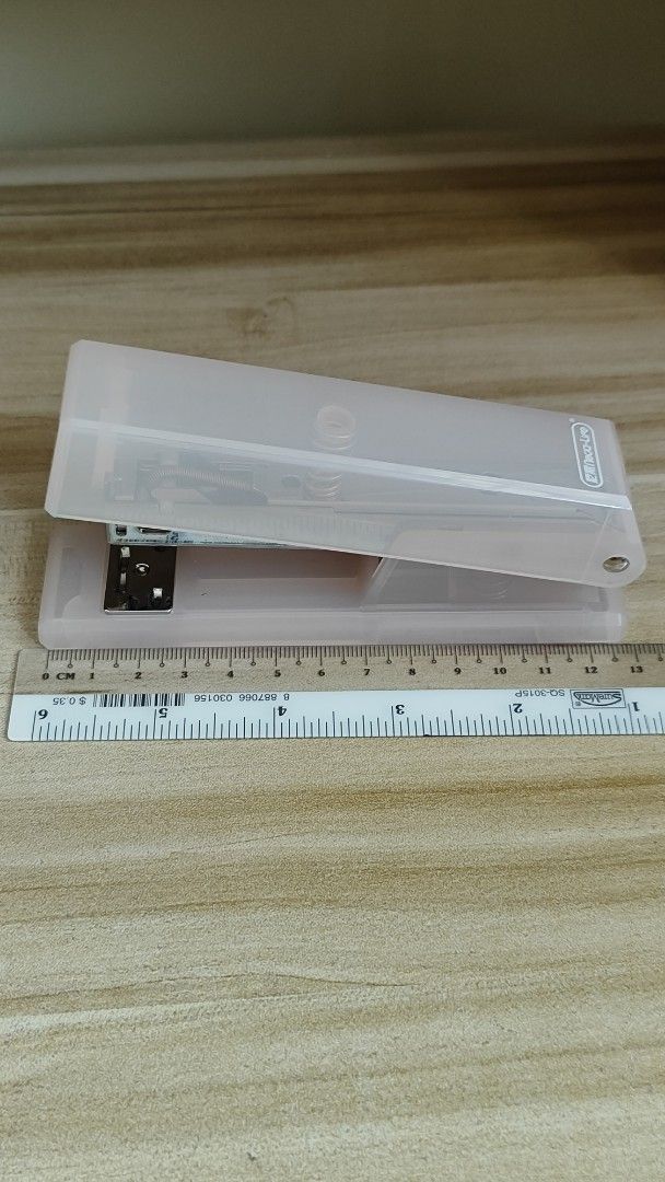 Desktop Stapler (Category: Stationery & School Supplies) located in Singapore. Submitted by Elise_Shop (Listing ID 1466794621, Image 2). Description: - Noca-Line desk stapler in translucent light pink. - Measures just about - Clear plastic casing housing everything. - Compact size for school or office desk use. - Standard staple loading. Stapler bullets does not come with it! .