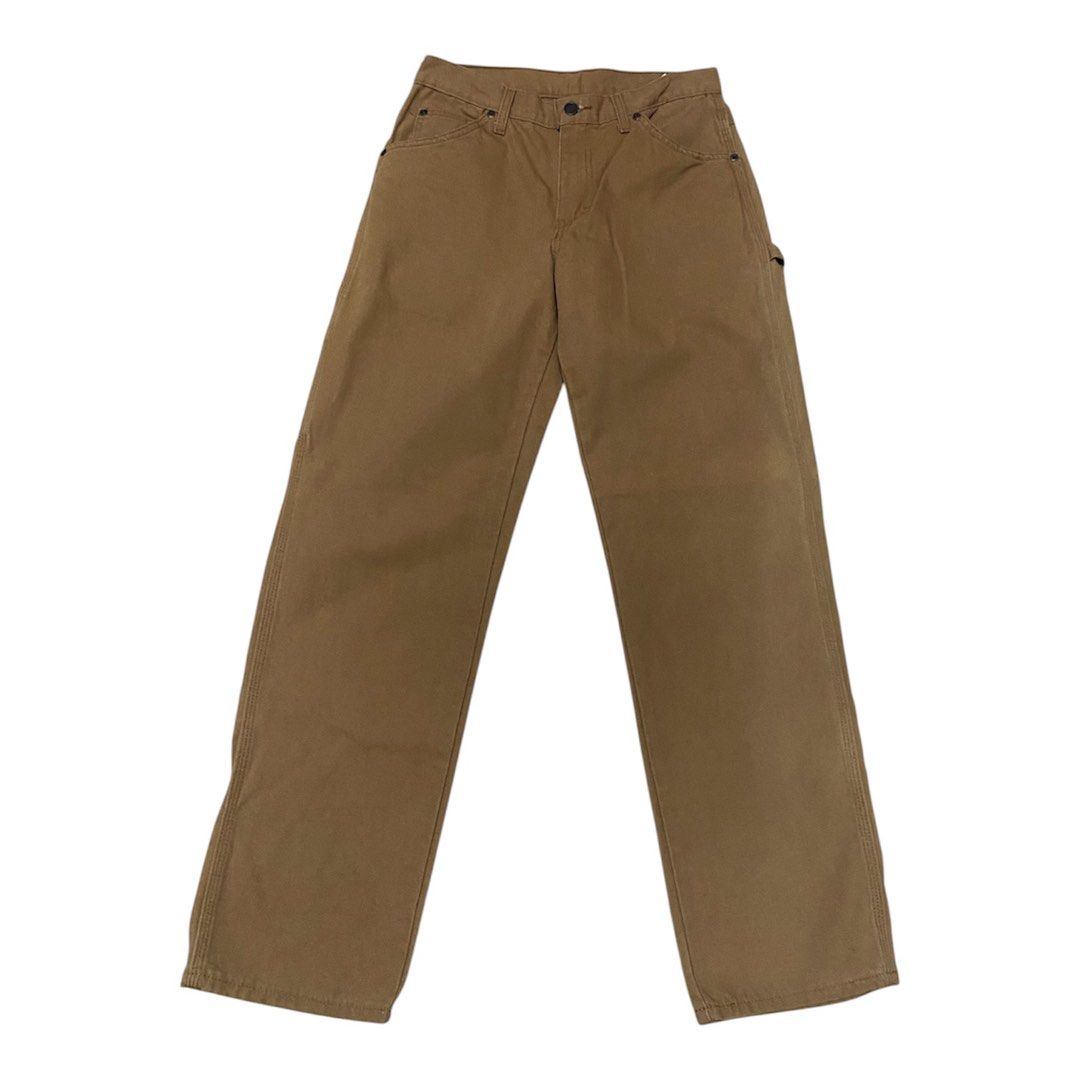 Dickies Brown Carpenter Pants Size 30x32 (Category: Jeans) located in Binan City. Submitted by doze16 (Listing ID 1466865511, Image 3). Description: - Brand: Dickies - Style: Carpenter pants / utility workwear - Color: Brown - Material: Durable cotton canvas - Size: 30x32 - Details: Side hammer loop, tool pockets, signature red logo patch on back pocket - Origin: Made in Mexico - Condition: Built to last for everyday wear.
