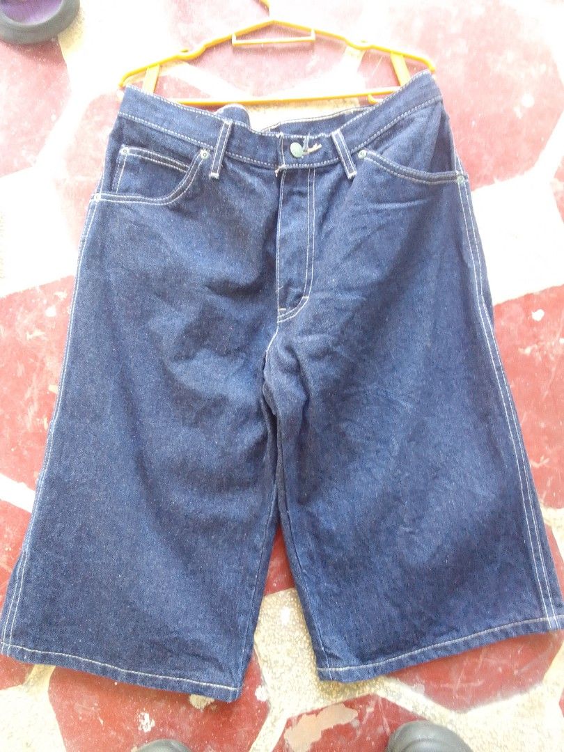 Dickies Cargo Shorts (Category: Shorts) located in Manila. Submitted by max_444 (Listing ID 1466886475, Image 2). Description: Dickies denim shorts in dark blue wash. Classic jorts length, hitting right around the knees. Multiple pockets including cargo pocket on the side and back pockets with stitching detail. Button closure and belt loops. Heavyweight denim material. -Size: leghole 12 waist 32 length 25½.