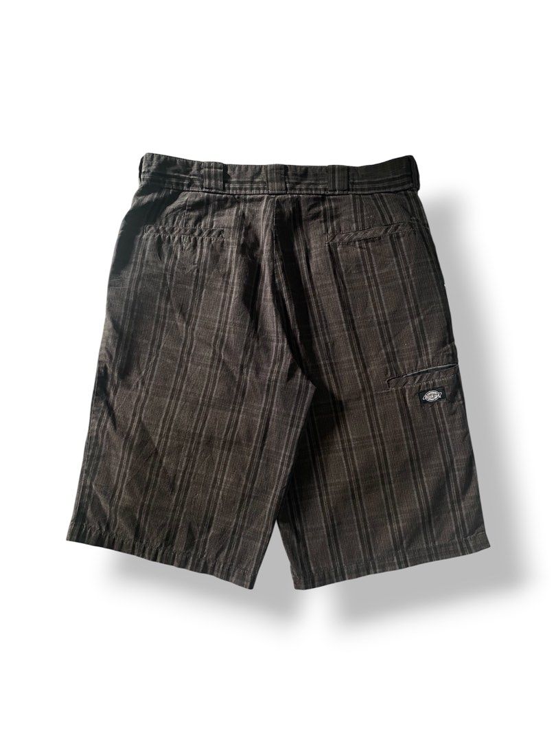 Dickies Regular Fit Pinstripe Shorts Brown (Category: Shorts) located in Mendez-Nunez. Submitted by leighthrift (Listing ID 1466890876, Image 2). Description: DICKIES BROWN PLAID DIMES: WAIST: 36 LENGTH: 24 THIGH: 14 HEM: 12 ISSUE: MINI SCRATCH - Brand: Dickies - Color: Brown with subtle vertical pinstripes - Fit: Regular fit - Details: Multiple utility pockets, signature logo patches on pocket flaps - Closure: Button closure with zip fly - Mater