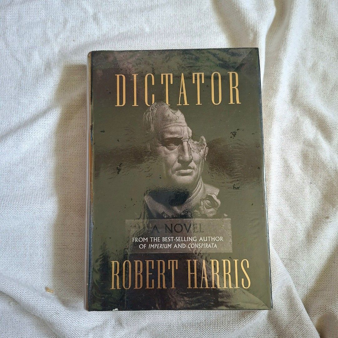 dictator by robert harris | hard cover historical political thriller #0050 (Category: Storybooks) located in Pasig City. Submitted by byveronica_ (Listing ID 1466821789, Image 1). Description: signs of use: i put plastic cover thrifted from biblio. price is SLIGHTLY negotiable, but lowballers will NOT be entertained! payments thru: gotyme, gcash, metrobank shipments thru: gogo xpress, same day delivery location: brgy. san joaquin, pasig city, met