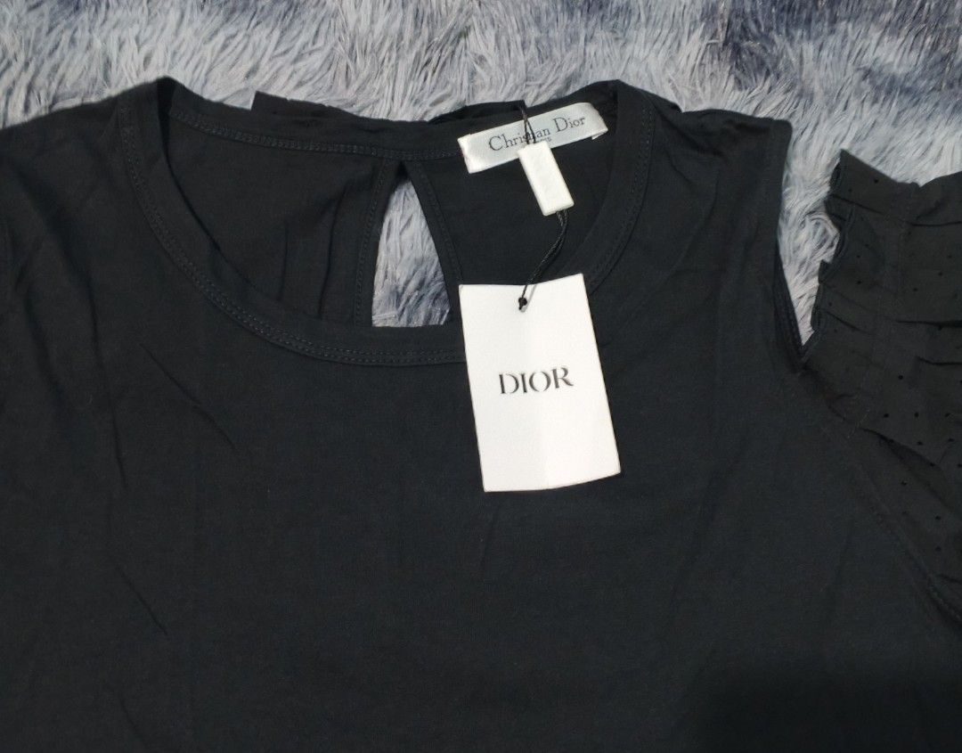 dior blouse new (Category: Blouses) located in Magalang. Submitted by trendz67271 (Listing ID 1466969413, Image 2). Description: brand new bought from abroad size reference in photos.