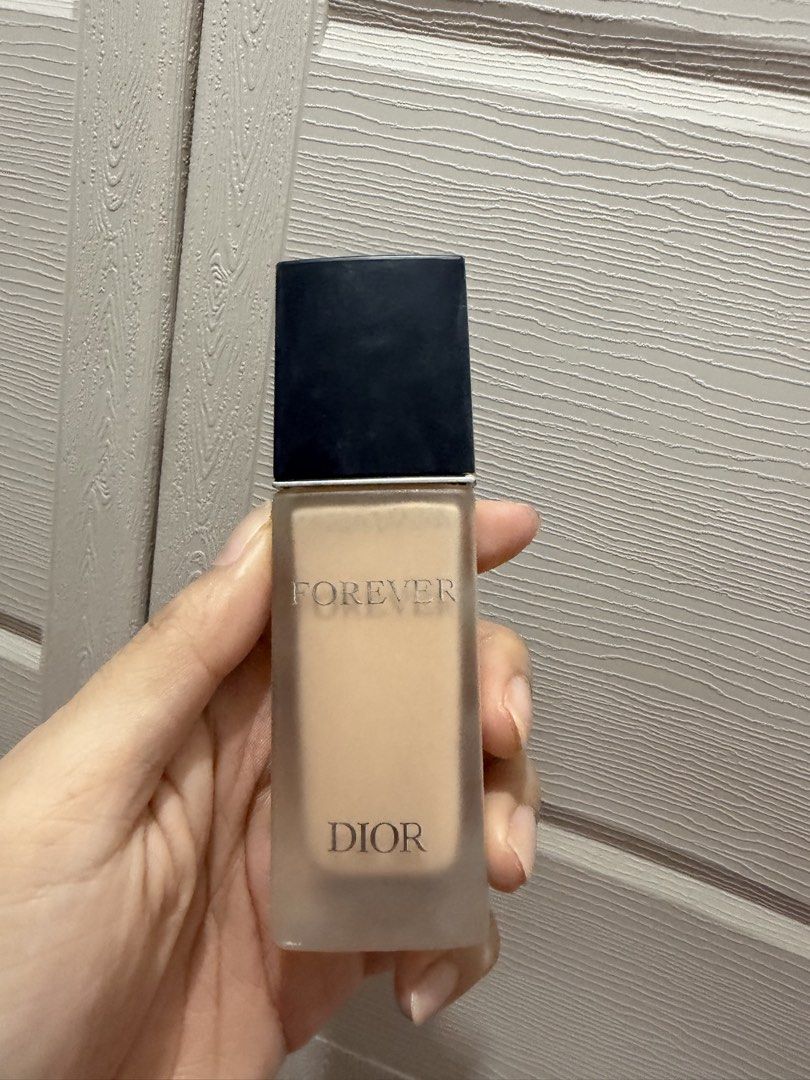 Dior Forever 24H Foundation Shade 1N (Category: Makeup) located in Davao. Submitted by fabdeclutter (Listing ID 1466965579, Image 1). Description: - Brand: Dior - Product: Forever 24h Wear High Perfection Skin-Caring Foundation - Shade: 1N Neutral - Finish & Protection: Matte finish with SPF 20 PA+++ - Packaging: Standard size frosted glass bottle with black cap and CD logo - Condition: Lots of product left based on visible fill line - Perfect fo