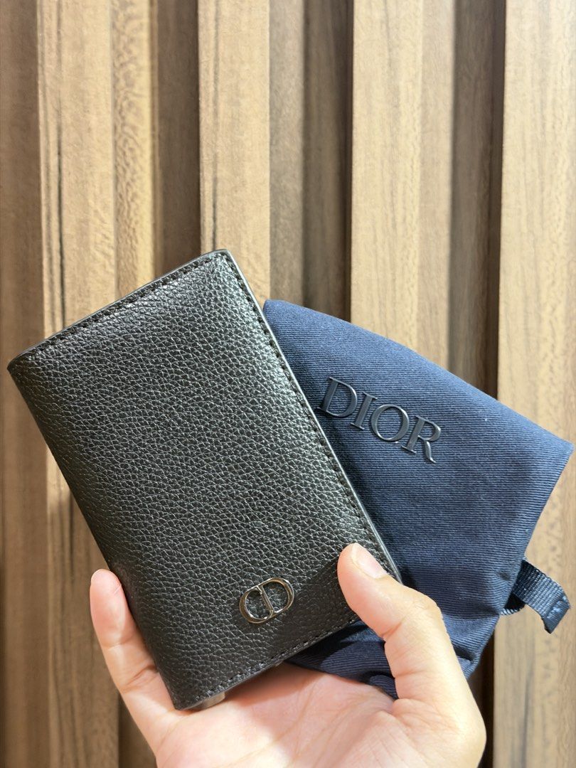 Dior GWP Black Leather Card Holder (Category: Luxury Bags & Wallets) located in Manila. Submitted by ktyyycloset (Listing ID 1466963652, Image 1). Description: - GWP Dior card holder in black grained calfskin - Features iconic silver-tone CD hardware on the front - Multiple card slots inside with heat-stamped Dior logo - Clean leather condition inside and out - Slim, pocket-friendly design with minimal bulk - Includes original dust bag and box -U