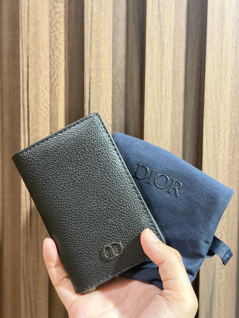 Dior GWP Black Leather Card Holder (Category: Luxury Bags & Wallets) located in Manila. Submitted by ktyyycloset (Listing ID 1466963652, Image 2). Description: - GWP Dior card holder in black grained calfskin - Features iconic silver-tone CD hardware on the front - Multiple card slots inside with heat-stamped Dior logo - Clean leather condition inside and out - Slim, pocket-friendly design with minimal bulk - Includes original dust bag and box -U
