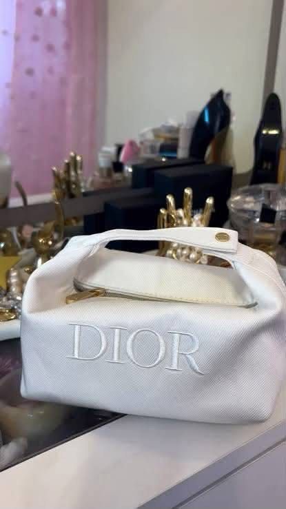 Dior White Pouch (Category: Luxury Bags & Wallets) located in Bulacan. Submitted by karisma_noverra (Listing ID 1466839298, Image 1). Description: Perfect for giveaways Multiple slots available.