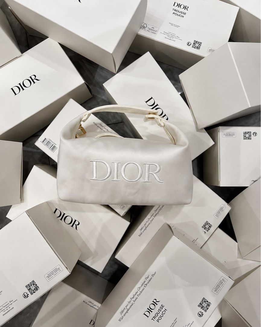 Dior White Pouch (Category: Luxury Bags & Wallets) located in Bulacan. Submitted by karisma_noverra (Listing ID 1466839298, Image 2). Description: Perfect for giveaways Multiple slots available.