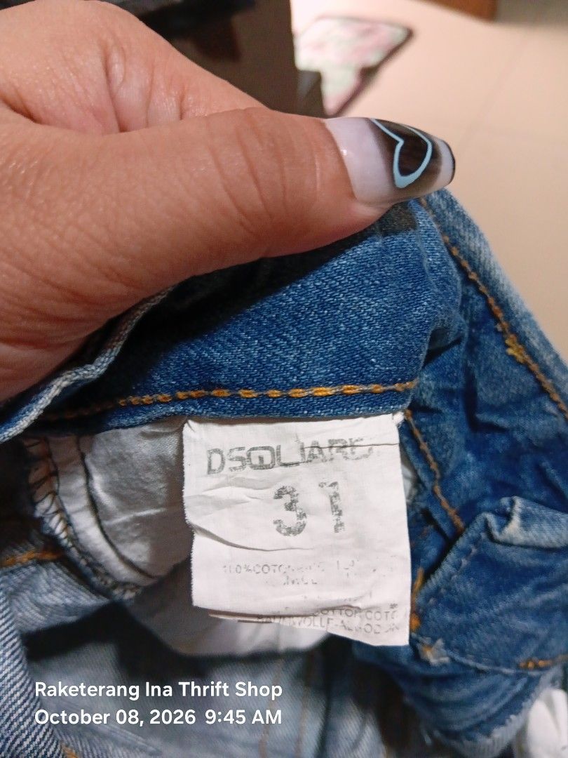 Distressed Denim Shorts (Category: Shorts) located in Valenzuela. Submitted by AnahThrift (Listing ID 1466871039, Image 3). Description: - Brand: DD - Item: Distressed denim shorts - Color: Blue wash - Details: Ripped details on front and back, signature shovel and pickaxe leather patch on waistband, button fly - Tag Size: 31 (Interior care label) - Measurements: 31-32x22x9 (Pocket tag) - Condition: Great piece for casual wear.