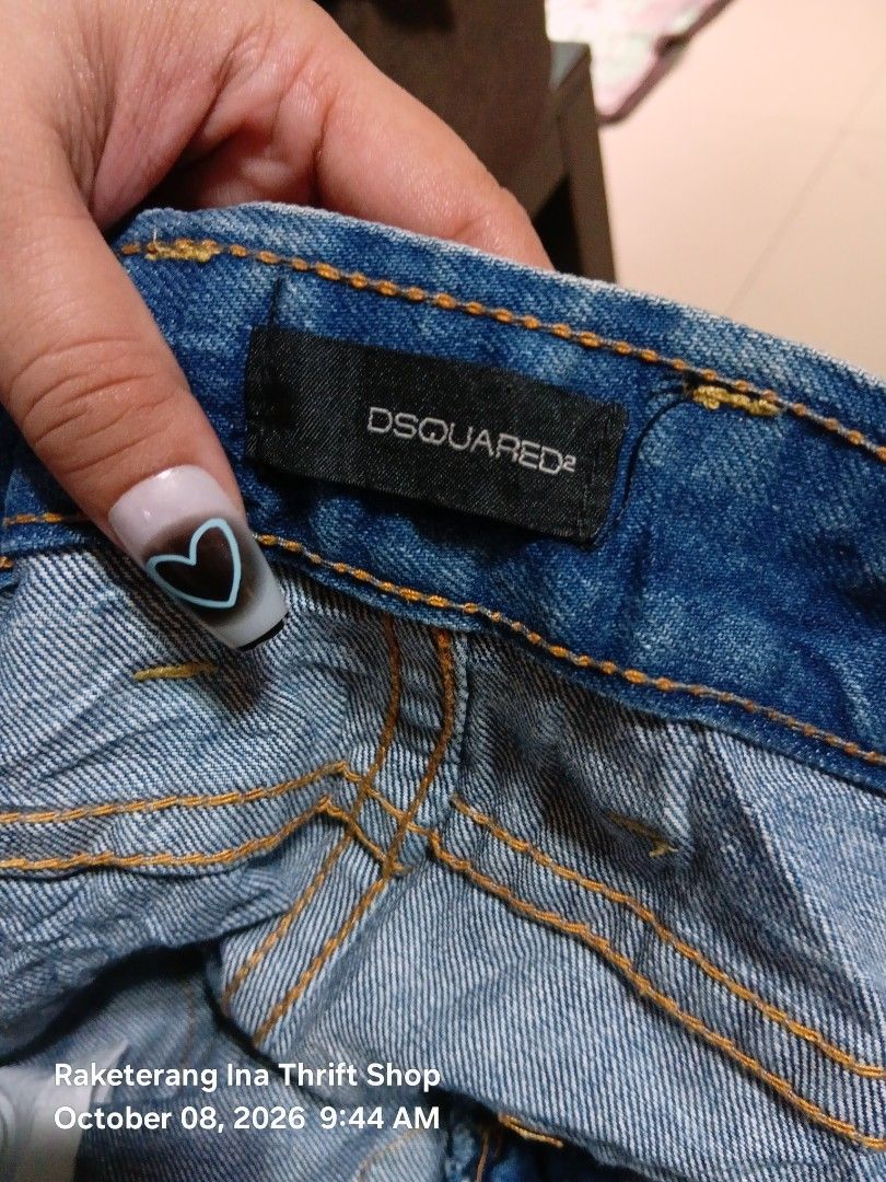 Distressed Denim Shorts (Category: Shorts) located in Valenzuela. Submitted by AnahThrift (Listing ID 1466871039, Image 2). Description: - Brand: DD - Item: Distressed denim shorts - Color: Blue wash - Details: Ripped details on front and back, signature shovel and pickaxe leather patch on waistband, button fly - Tag Size: 31 (Interior care label) - Measurements: 31-32x22x9 (Pocket tag) - Condition: Great piece for casual wear.
