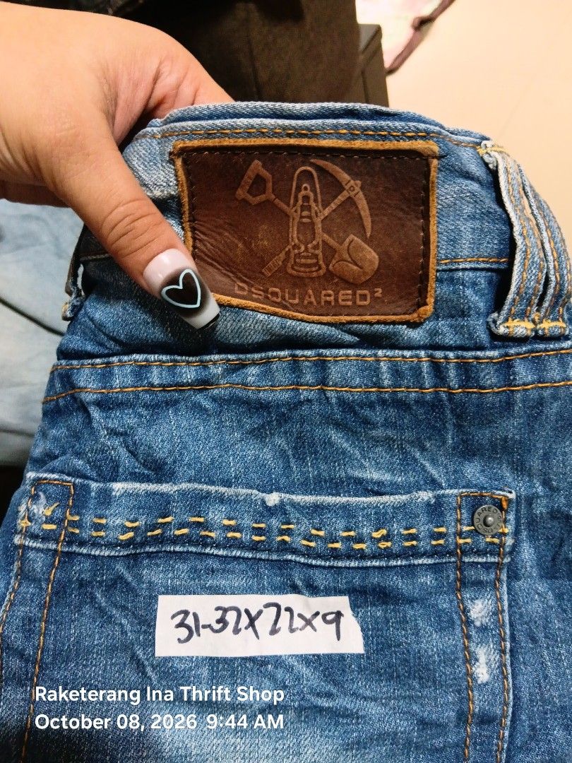 Distressed Denim Shorts (Category: Shorts) located in Valenzuela. Submitted by AnahThrift (Listing ID 1466871039, Image 1). Description: - Brand: DD - Item: Distressed denim shorts - Color: Blue wash - Details: Ripped details on front and back, signature shovel and pickaxe leather patch on waistband, button fly - Tag Size: 31 (Interior care label) - Measurements: 31-32x22x9 (Pocket tag) - Condition: Great piece for casual wear.