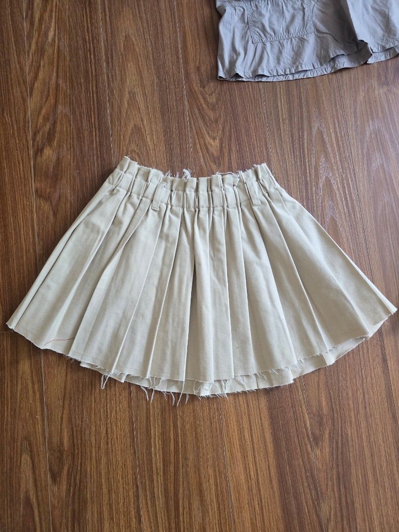 Divided by H&M Pleated Checkered Skirt (Category: Skirts) located in Manila. Submitted by mibellascloset (Listing ID 1466797230, Image 3). Description: take all for 500 - Brand: Divided by H&M - Design: Classic black and white plaid pattern - Style: Pleated, short length, schoolgirl aesthetic - Size: EUR 32 - Closure: Convenient side zipper - Material: Lightweight and easy to style - Condition: Wardrobe clear-out piece, perfect to pair with overs