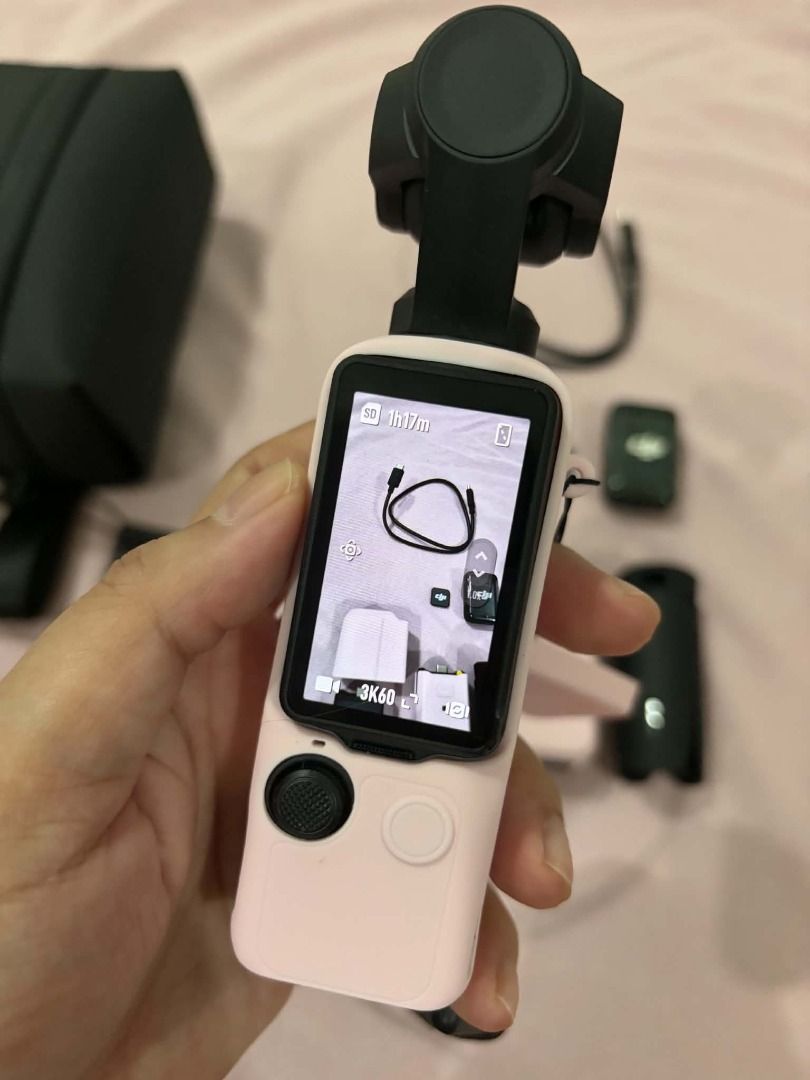 DJI OSMO POCKET 3 CREATOR COMBBO (Category: Camera Bags & Carriers) located in Subic. Submitted by lovebonnieb (Listing ID 1466954458, Image 2). Description: DJI Osmo Pocket 3 Creator Combo Condition / Date Purchased: Purchased last August 2026 Reason for Selling: Upgrading to Pocket 4 Inclusions (Complete Creator Combo Accessories): DJI Osmo Pocket 3 Camera DJI Mic 2 Transmitter Mic Windscreen Mic Clip Magnet Battery Handle Handle with 1/4" Thre